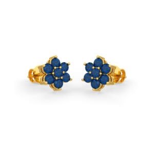 Blue sapphires set in gold in a floral pattern