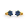 Blue sapphires set in gold in a floral pattern